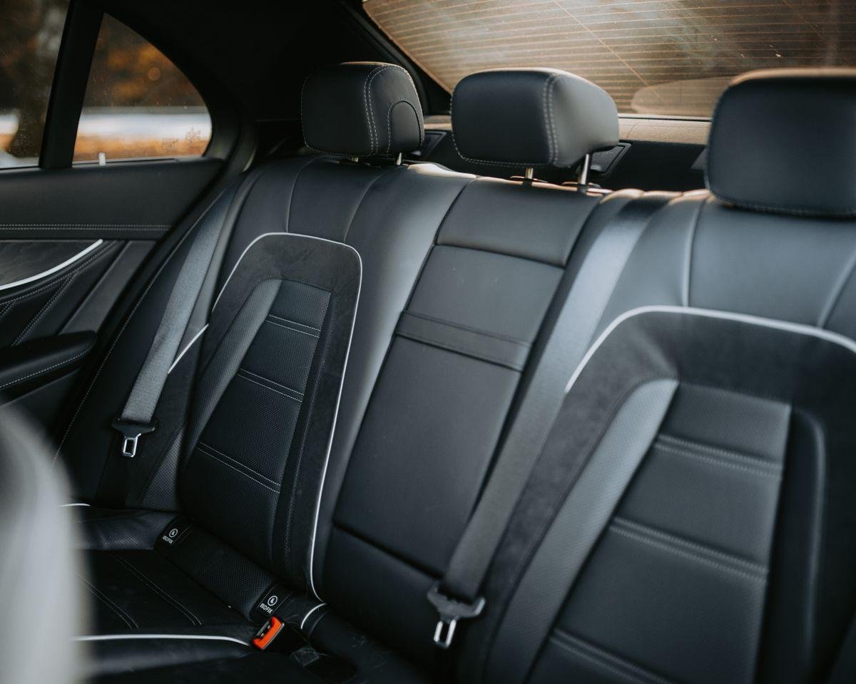 Black leather car seats, illustrating leather car seat restoration in Auckland