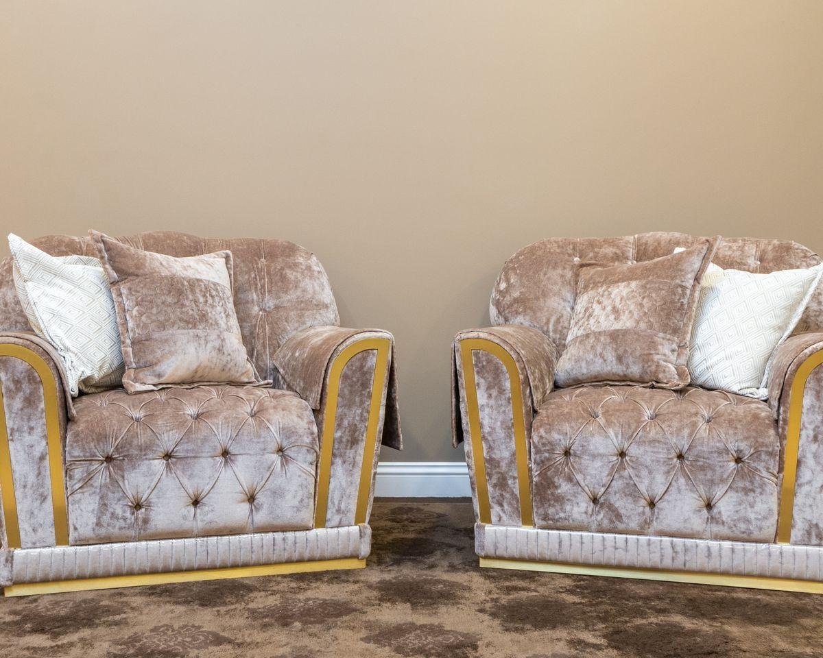 Velvet upholstered armchairs in a modern living room, illustrating reupholstery in Auckland